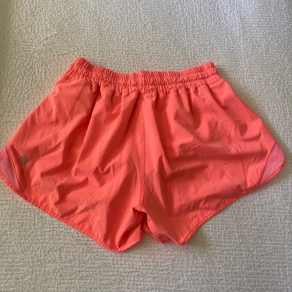 Lululemon Hotty Hot Low-Rise Lined Short 4" in Orange, size 8 tall